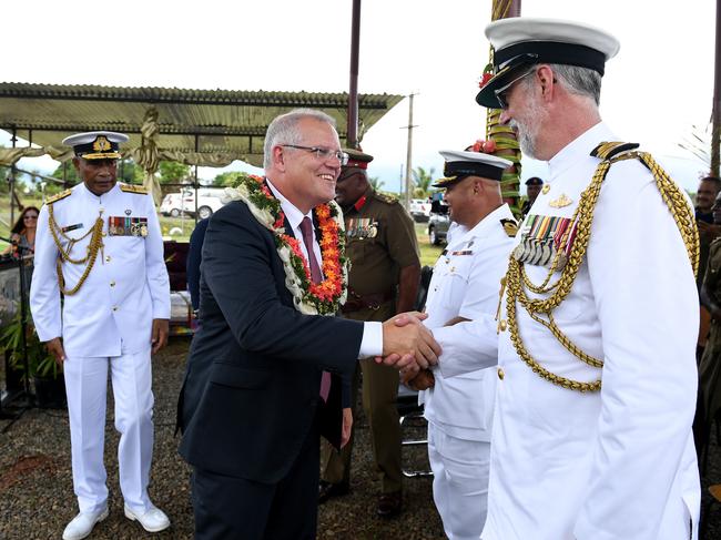 Australian Prime Minister Scott Morrison greets officers during a visit to the Blackrock Camp Project in Nadi, Fiji, Friday, January 18, 2019. Scott Morrison is in Fiji to announce significant economic and security partnership with the island nation. (AAP Image/Dan Himbrechts) NO ARCHIVING