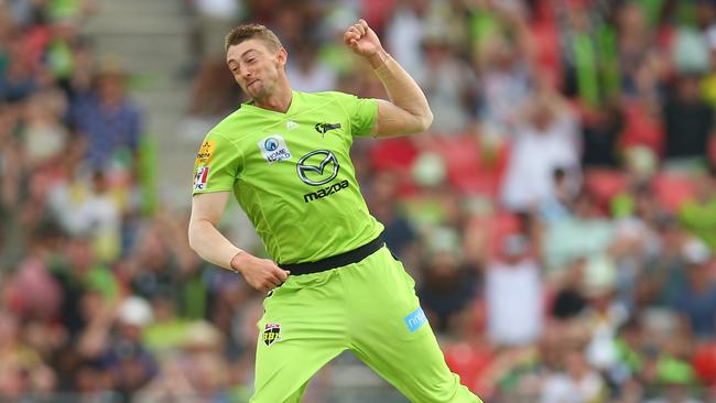 Daniel Sams jumps for joy after snaring a wicket for Sydney Thunder.