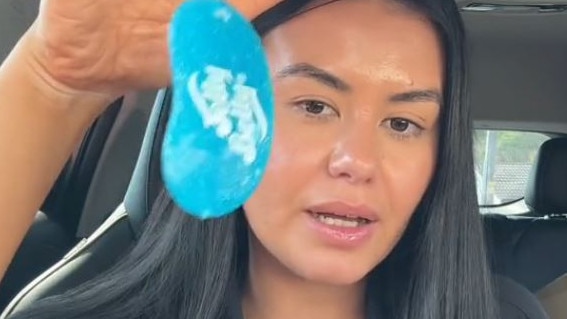 Perth resident, Janelle McEvoy, says a police officer told her she could be fined for having an air freshener hanging from her rearview mirror. Picture: TikTok