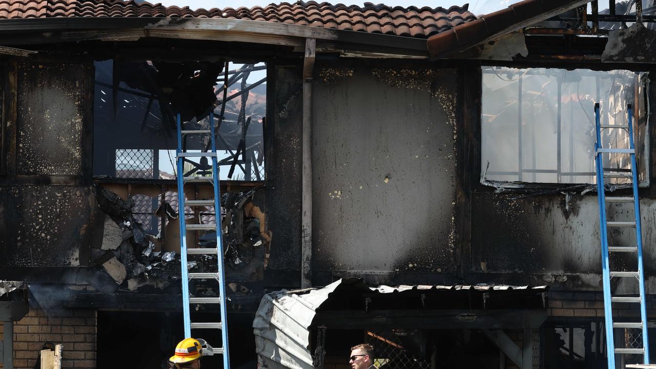 Girl, 8, dead, woman missing after horror fire