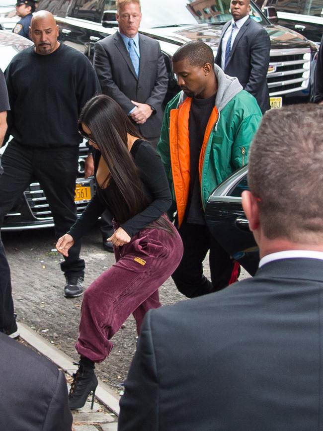 Kim Kardashian’s engagement ring was noticeably absent as she reunited with husband Kanye West in New York City after fleeing Paris. Picture: Splash