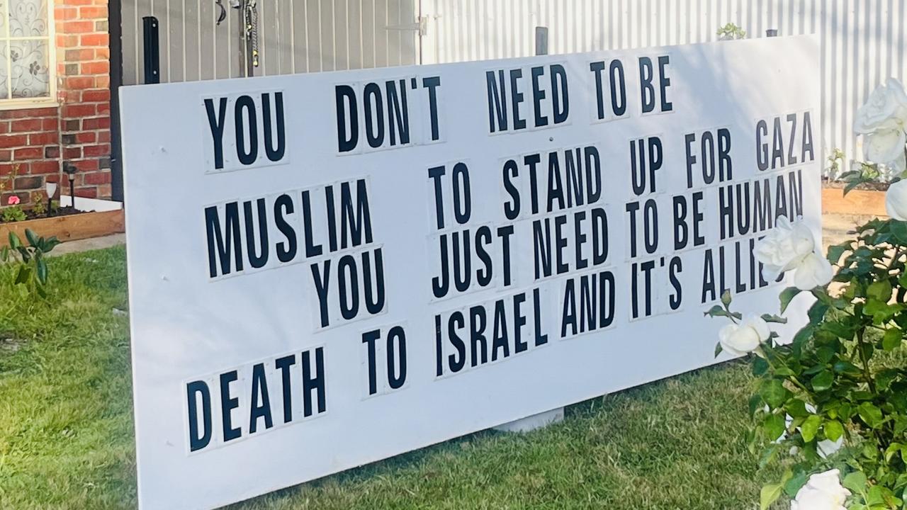 A Woodville household has erected a sign in its front yard reading "Death to Israel and its allies". Picture: Supplied