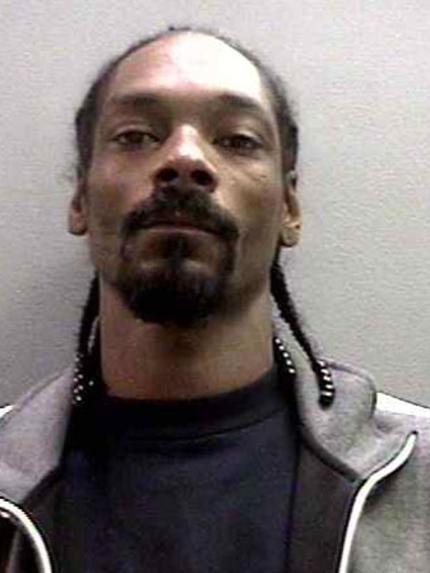 <b>Snoop Dogg</b> turned himself in to authorities in November 2006, four days after charges were laid for possession of a deadly weapon. That charge related to a collapsible baton found in his luggage at California’s John Wayne Airport in September that year, but the rapper — real name Calvin Broadus — was also arrested at Bob Hope airport in October over gun and drug possession. Then later in November, he faced a third arrest in three months, again over a firearm and drugs, as he left <i>The Tonight Show With Jay Leno</i>. He was given probation and community service. Picture: Supplied