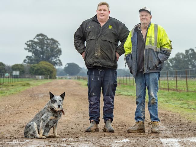 NEWS: FAST RAIL at WahringFast rail. Philip Deane was offered millions for his farming land.PICTURED:  Philip and his son Wes Deane on their farm at Wahring.PICTURE: ZOE PHILLIPS with their old heeler dog named Penny.