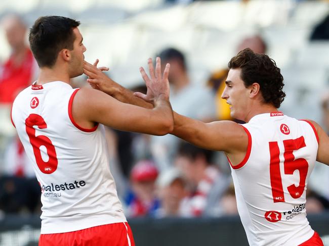 Sam Wicks celebrates with Logan McDonald. (Photo by Michael Willson/AFL Photos via Getty Images)