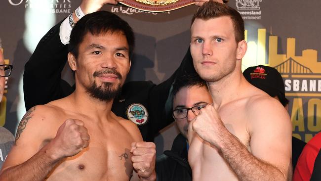 Manny Pacquiao and Jeff Horn at the official weigh-in for their fight on Saturday. Picture: AAP