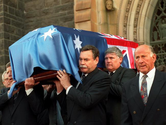 Ron Barassi and Charlie Sutton, were among the pallbearers at the funeral of Ted Whitten.