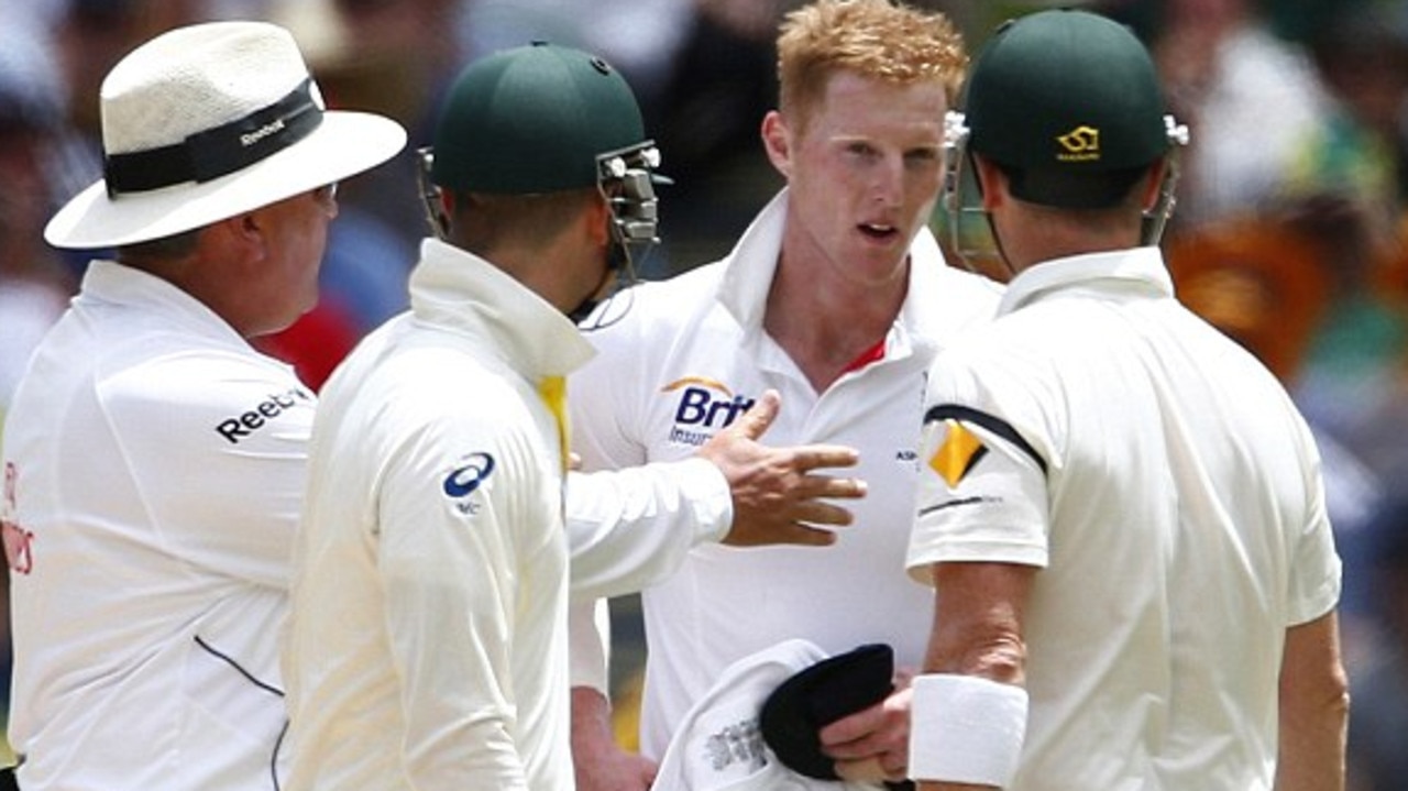 Umpire Marais Erasmus (L) intervenes to stop an argument between Australia's captain Michael Clarke (2nd L) and teammate Brad Haddin with England's Ben Stokes (2nd R) after the replay announcing Haddin is not out due to a no ball during the second day of the second Ashes test cricket match at the Adelaide Oval December 6, 2013. REUTERS/David Gray (AUSTRALIA - Tags: SPORT CRICKET)