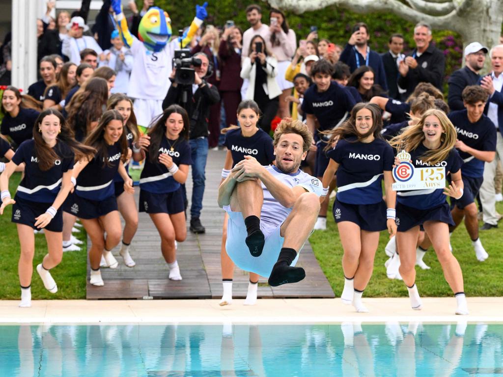 Norway's Casper Ruud dives into the pool after beating Greece's Stefanos Tsitsipas during the ATP Barcelona Open "Conde de Godo" tennis tournament. Picture: Josep Lago/AFP