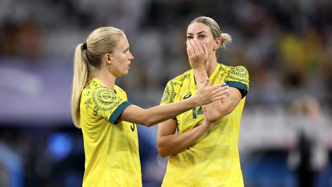 Kaitlyn Torpey and Alanna Kennedy. Photo by Alex Livesey/Getty Images.