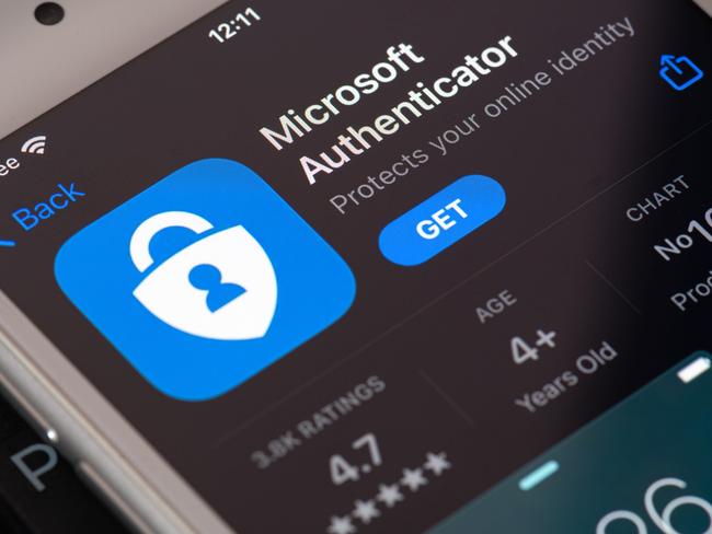 Guilherand-Granges, France - February 08, 2021. Smartphone with Microsoft Authenticator app logo. Two-factor authentication program that provides added security to your online accounts.