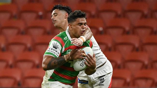 Latrell Mitchell hit by Jayden Sullivan. Picture: NRL Photos