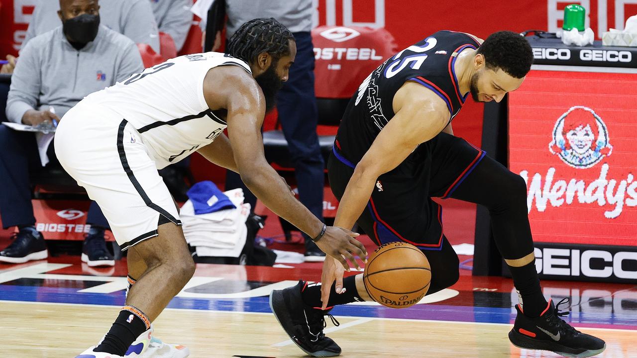 PHILADELPHIA, PENNSYLVANIA - FEBRUARY 06: Ben Simmons #25 of the Philadelphia 76ers strips the ball from James Harden #13 of the Brooklyn Nets during the third quarter at Wells Fargo Center on February 06, 2021 in Philadelphia, Pennsylvania. NOTE TO USER: User expressly acknowledges and agrees that, by downloading and or using this photograph, User is consenting to the terms and conditions of the Getty Images License Agreement. Tim Nwachukwu/Getty Images/AFP == FOR NEWSPAPERS, INTERNET, TELCOS &amp; TELEVISION USE ONLY ==