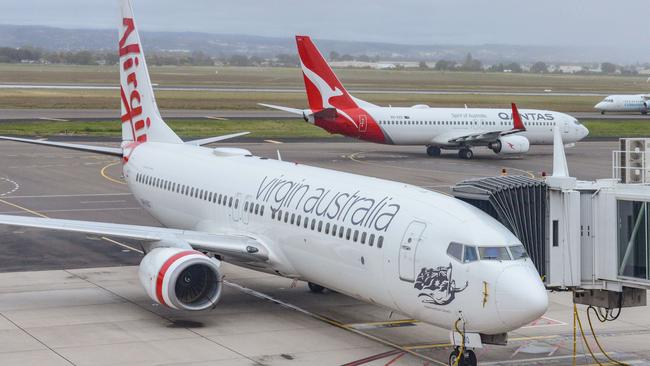 ADELAIDE, AUSTRALIA - NewsWire Photos SEPTEMBER 22, 2021: Virgin, Qantas and Cobham aircraft at Adelaide Airport. Picture: NCA NewsWire /Brenton Edwards