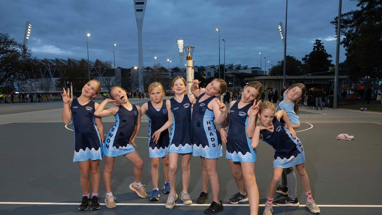 Barwon Heads under-11 netball team pull their funniest faces.