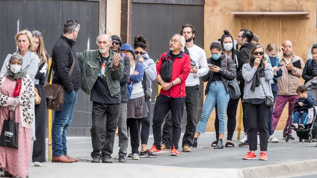 People queue at Centrelink in Abbotsford this morning. Picture: Jake Nowakowski