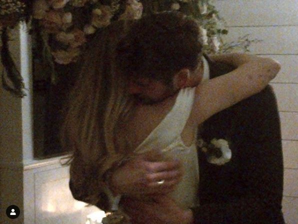 Miley Cyrus and Liam Hemsworth hug each other on their wedding day. Picture: Instagram/Billy Ray Cyrus