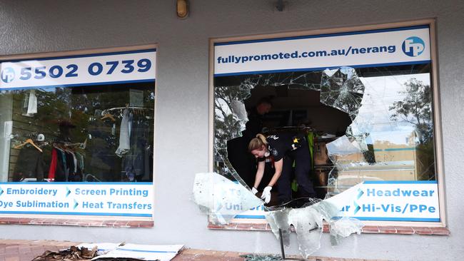 Police at the scene of a fire at Fully Promoted in Nerang St, Nerang. Photograph: Jason O'Brien