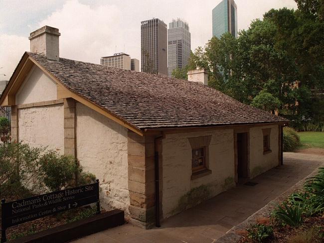 Two eras ... Cadman's Cottage, situated at 110 George St, The Rocks, is dwarfed by the city’s skyscrapers. Picture: Steve Moorhouse