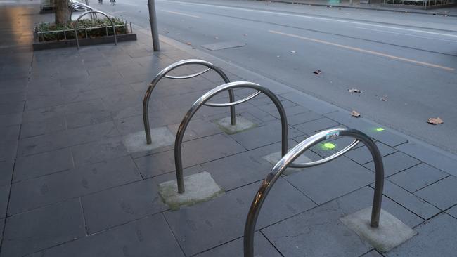 An empty bike rack in Swanston Street, Melbourne. Picture: David Crosling