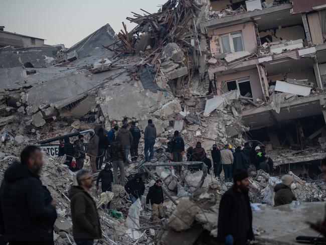 People wait for news of their loved ones in Hatay, Turkey. Picture: Getty