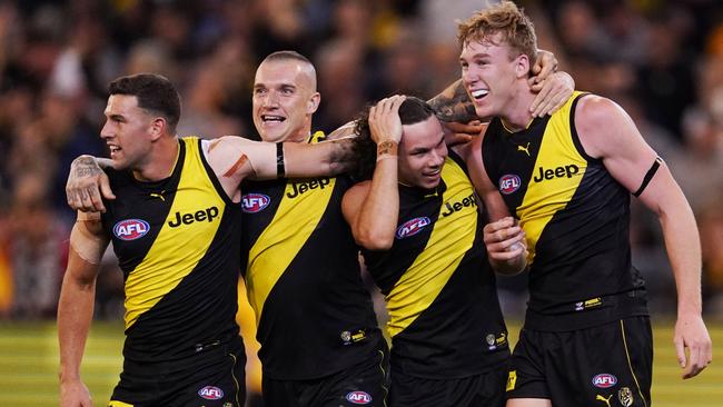 Richmond players celebrate their 2019 preliminary final win over Geelong. Picture: AAP Image/Michael Dodge