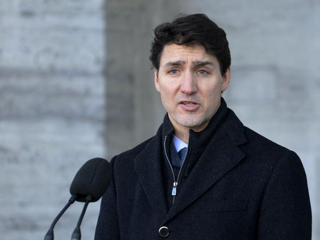 Prime Minister Justin Trudeau addresses the media in Ottawa, Ontario on Monday, Jan. 14, 2019. A Chinese court sentenced Robert Lloyd Schellenberg, a Canadian man to death Monday in a sudden retrial in a drug smuggling case. Trudeau said he is extremely concerned that China chose to "arbitrarily" apply the death penalty to a Canadian citizen. (Adrian Wyld/The Canadian Press via AP)