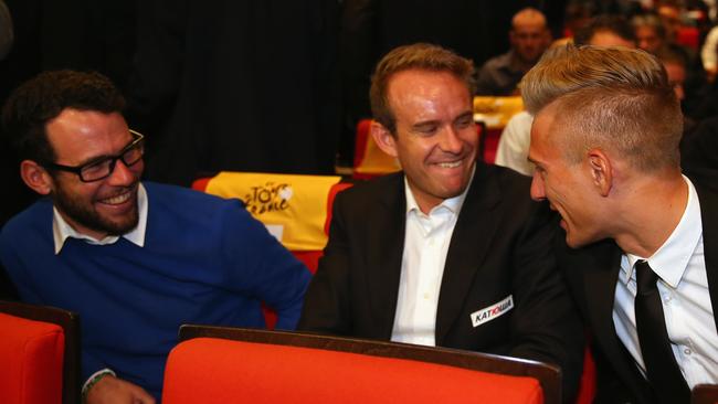 Mark Cavendish (L) chats to Marcel Kittel of Germany (R) at the 2015 Tour de France route presentation.