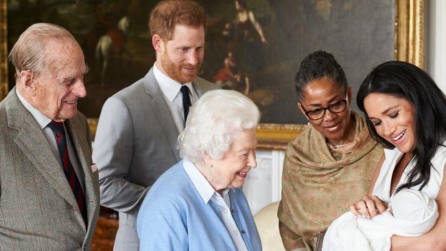 Prince Harry with Meghan and her mother Doria Ragland, showing baby, Archie Harrison Mountbatten-Windsor to Queen Elizabeth II and Prince Philip. Picture: Picture: AFP