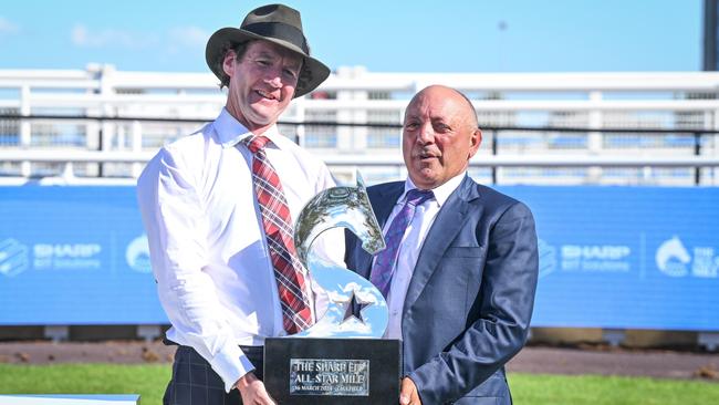 Pride Of Jenni’s trainer Ciaron Maher with owner Tony Ottobre after the All-Star Mile triumph. Picture: Racing Photos via Getty Images