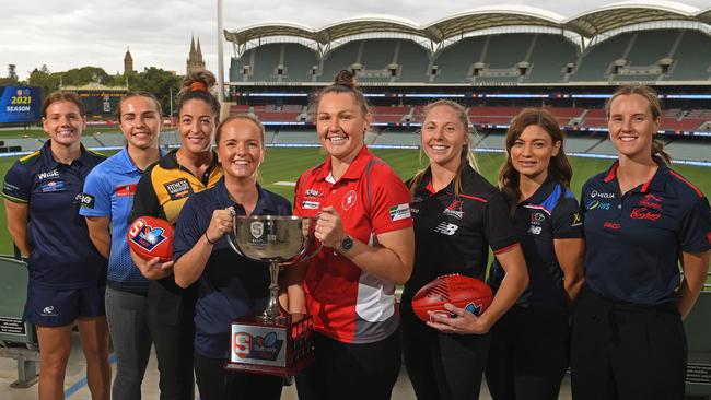 SANFLW captains at the 2021 season launch at Adelaide Oval. (L-R) Anni Falkenberg (Woodville-West Torrens), Maya Rigter (Sturt), Ellie Kellock (Glenelg), Elyse Haylock (South Adelaide), Kristi Harvey (North Adelaide), Bec Owen (West Adelaide), Shelby Smith (Central District) and Alison Ferrall (Norwood). Picture: Tom Huntley