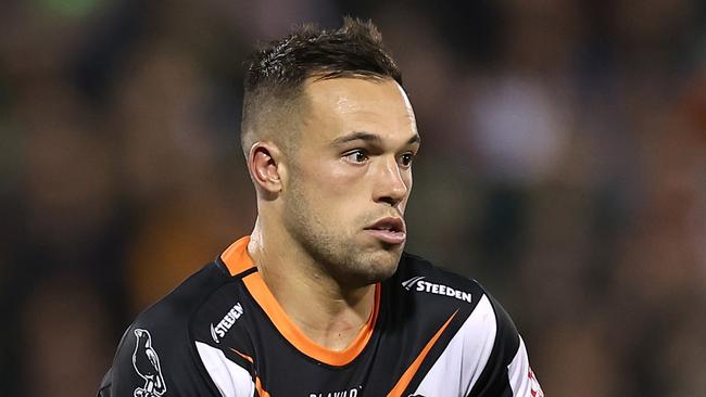 SYDNEY, AUSTRALIA - JUNE 02: Luke Brooks of the Wests Tigers runs the ball during the round 14 NRL match between Wests Tigers and Canberra Raiders at Campbelltown Stadium on June 02, 2023 in Sydney, Australia. (Photo by Cameron Spencer/Getty Images)