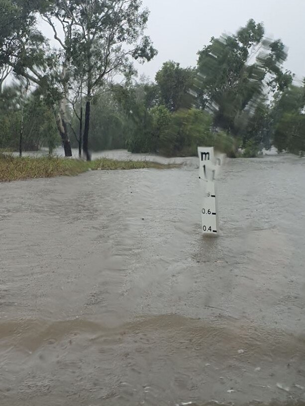 The flooded Bruce Highway in Home Hill yesterday. Photo: Graham Baker