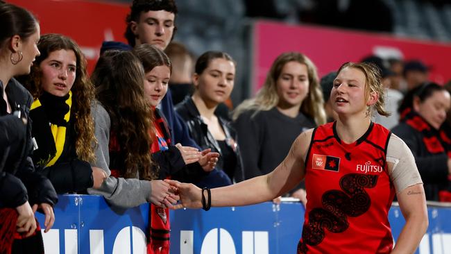 Paige Scott of the Bombers thanks fans during the 2023 AFLW Round 07 match between the Richmond Tigers and the Essendon Bombers at IKON Park on October 14, 2023 in Melbourne, Australia. (Photo by Michael Willson/AFL Photos via Getty Images)