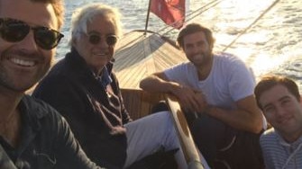 Dennis O’Neil on the water with his with his sons Ned, Jake and Toby.