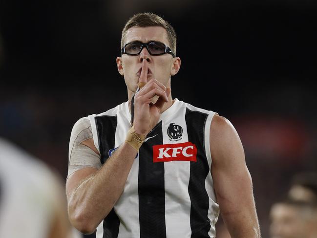 MELBOURNE , AUSTRALIA. May 3, 2024.  AFL. Carlton vs Collingwood at the MCG. Shhhh.  Mason Cox of the Magpies gestures towards the crowd after kicking a 2nd qtr goal    . Pic: Michael Klein