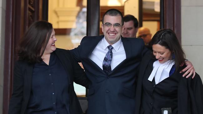 Gangland figure Faruk Orman walks from the Supreme Court after being acquitted. Ruth Parker, Farouk Orman and Carly Marcs Lloyd. Picture: Alex Coppel