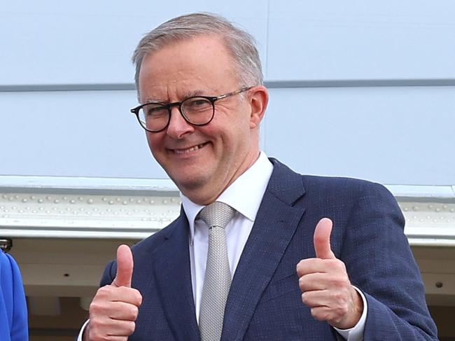 CANBERRA, AUSTRALIA - MAY 23: Prime Minister Anthony Albanese stands with newly appointed Foreign Minister Penny Wong, at the door of their plane on May 23, 2022 in Canberra, Australia. Albanese is travelling to Japan to attend the QUAD Leaders' meeting in Tokyo. Albanese was sworn in as Australia's 31st prime minister on Monday morning following his victory over Scott Morrison in the federal election on Saturday. (Photo by David Gray/Getty Images)