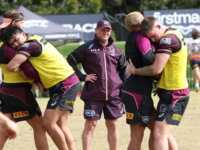 Corey Parker says Brisbane players need to take responsibility for the departure of former coach Kevin Walters (C). Picture: Liam Kidston