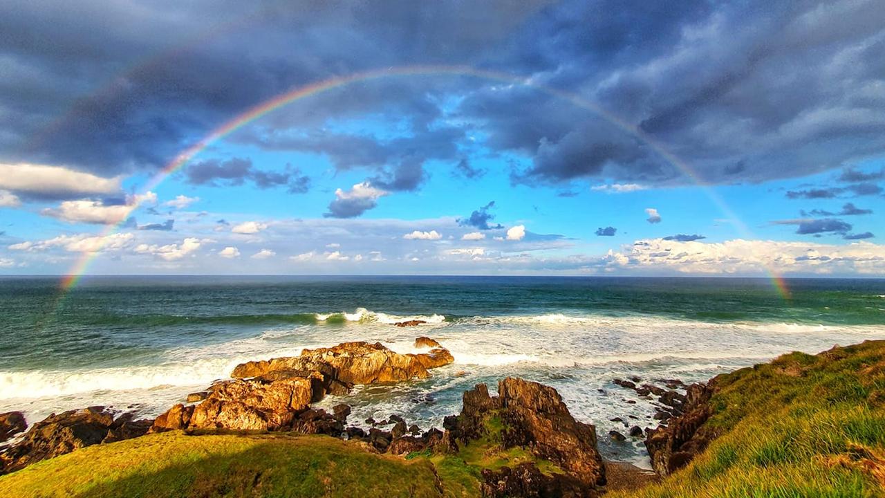 Sunday afternoon rainbows at Boambee Headland by reader Bronwyn Hawkes.