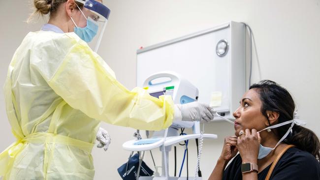 A nurse in personal protective equipment at the PA Hospital tests for coronavirus (COVID-19).