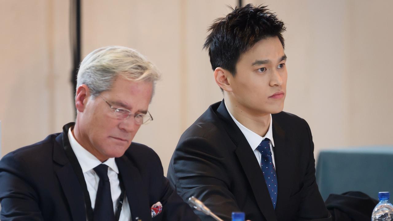 China's swimming star Sun Yang (R), accused of smashing a blood vial with a hammer, looks on next to his counsel Ian Meaking prior to his public hearing before the Court of Arbitration for Sport (CAS).