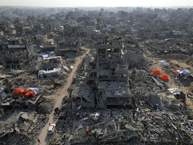 An aerial photograph taken by a drone shows tents amid the destruction caused by the Israeli air and ground offensive in Beit Lahiya, northern Gaza Strip. Picture: AP Photo/Mohammad Abu Samra