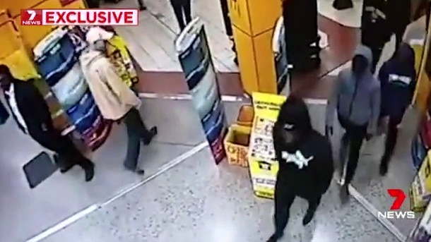 CCTV grabs of African youths entering JB Hi-Fi where they stole electronic equipment. Picture: 7 News