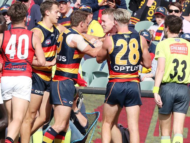 Tempers Flare between Adelaide’s Matt crouch and Essendon's Jacob Townsend.