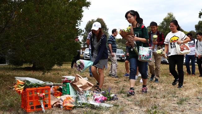 Students from nearby La Trobe University lay flowers at the site where exchange student Aia Masarwe was found dead in Bundoora. Picture: Aaron Francis/The Australian