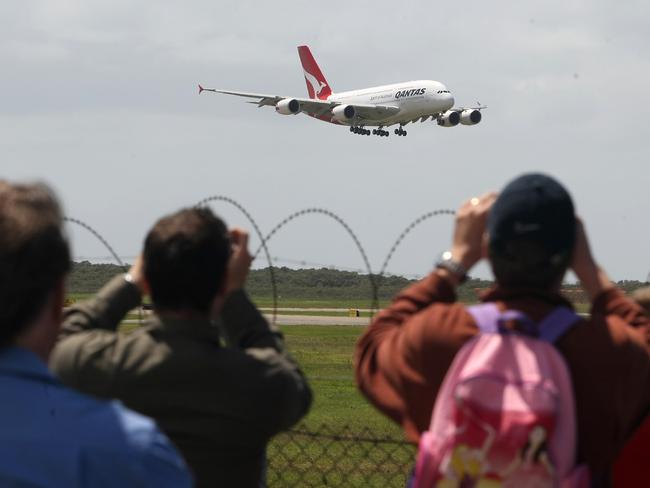 Plane spotters at Brisbane Airport waiting and watching for the Qantas A380 to land.