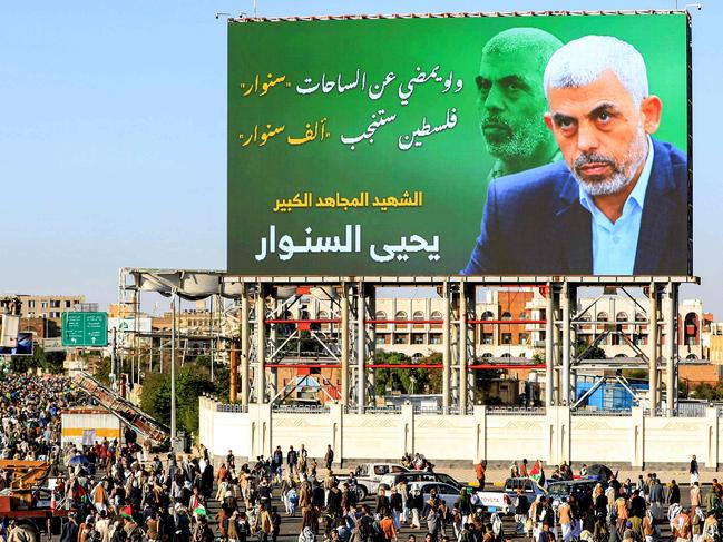 A billboard depicting Hamas' slain leader Yahya Sinwar with the Arabic slogan "if Sinwar departs from the battlefields, Palestine will birth a thousand Sinwars". Picture: AFP