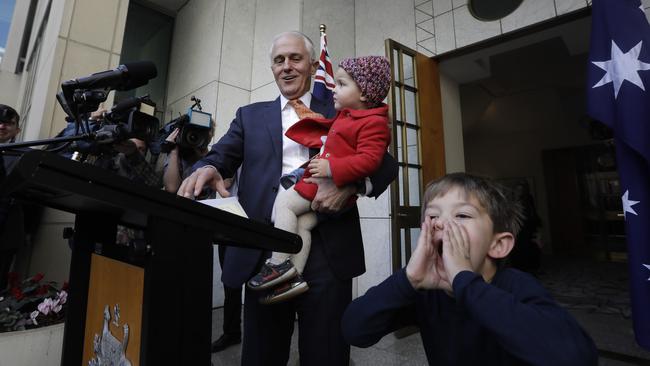 Turnbull gives a press conference accompanied by his grandson Jack and granddaughter Alice after the spill vote in which Morrison was elected leader. Picture: Sean Davey