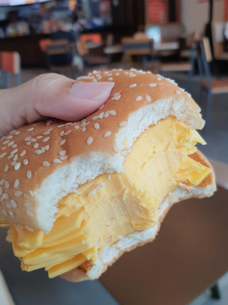 ‘I love cheese but I struggled eating even half of this ‘burger’.’ Picture: Facebook